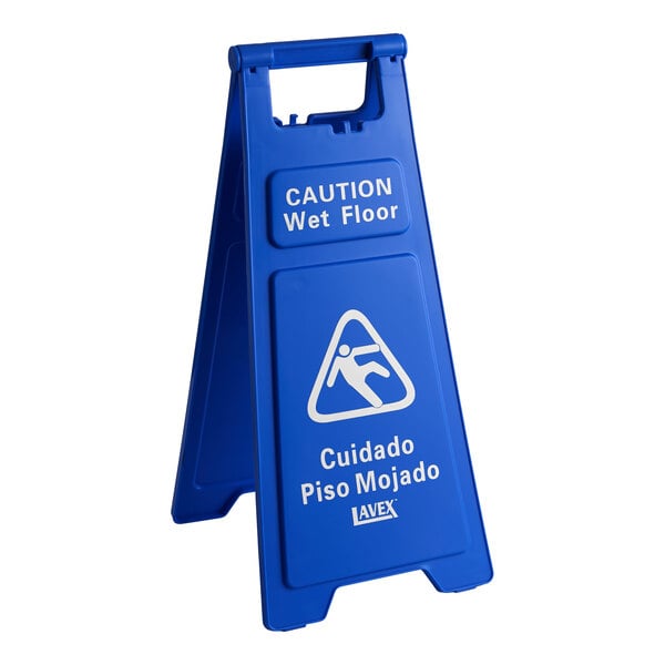 A blue polypropylene A-frame sign with 'CAUTION Wet Floor' and 'Cuidado Piso Mojado' warnings.