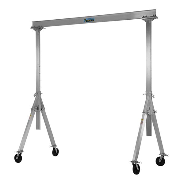 An aluminum Vestil gantry crane with wheels.