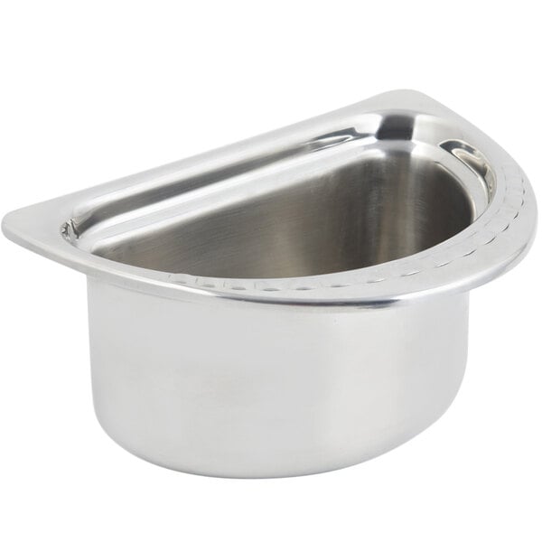 A Bon Chef stainless steel decorative oval food pan with an arches design.