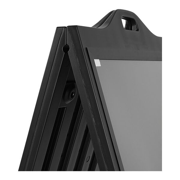 A black frame with a white plastic cover over a sign board.