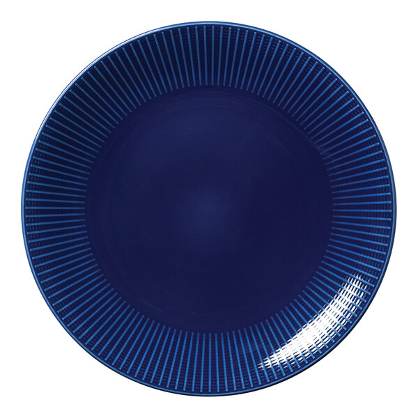 A close-up of a Steelite Willow Azure coupe plate with a blue and white stripe pattern.