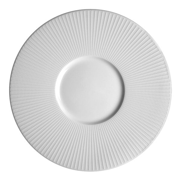 A close-up of a Steelite Distinction Willow white plate with a pattern of spirals.