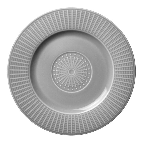 A white Steelite Willow accent plate with a circular design of lines and dots.