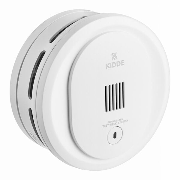 A white Kidde round smoke alarm with a button on the bottom.