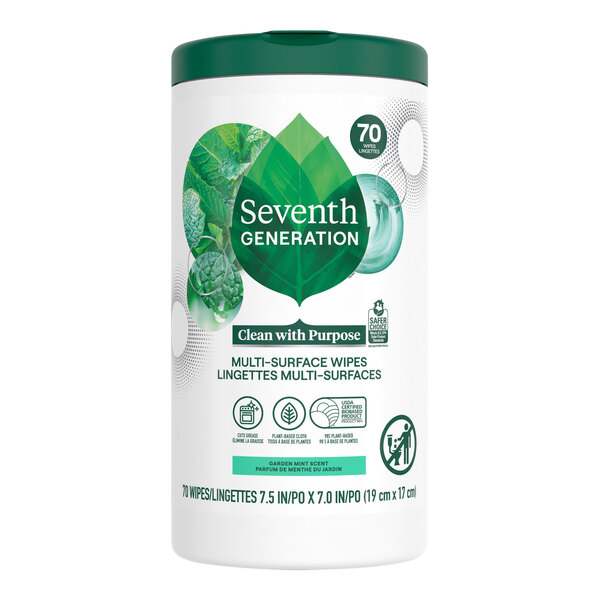 A white container of Seventh Generation Garden Mint Multi-Surface wipes with green leaves and white text.