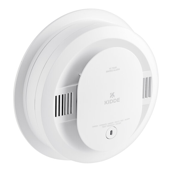 A close-up of a Kidde white circular smoke detector with a round lid.