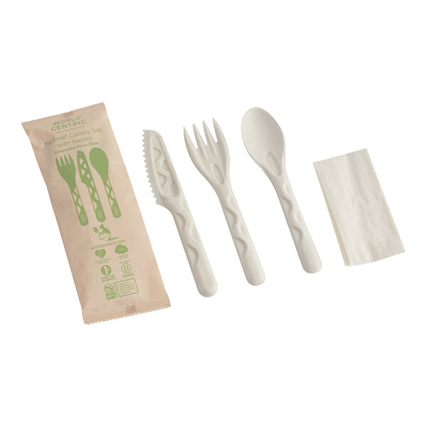A package of World Centric compostable cutlery with a napkin.