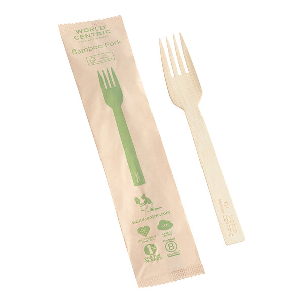 A paper package with a World Centric compostable bamboo fork.