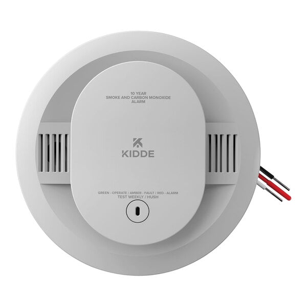 A white Kidde smoke and carbon monoxide alarm with red wires and a round top.