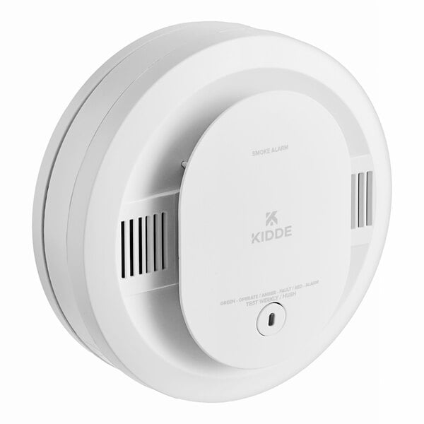 A white round Kidde smoke alarm with a button.