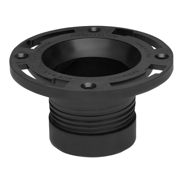 A black round Oatey Twist-N-Set water closet flange with holes in it.