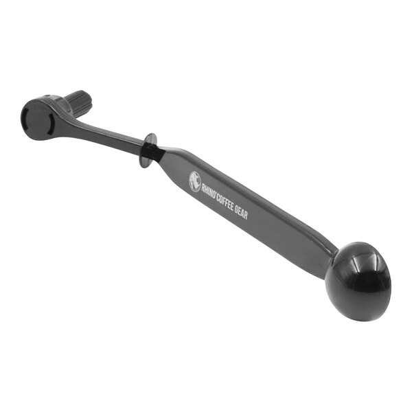 A black tool with a black handle and metal ball on the end.