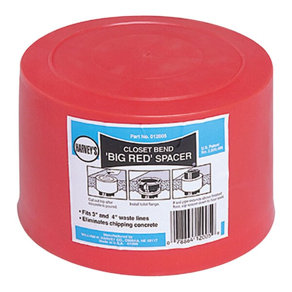 A red plastic container with a label on it.