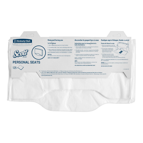 A white package of Scott Pro toilet seat covers with blue text.