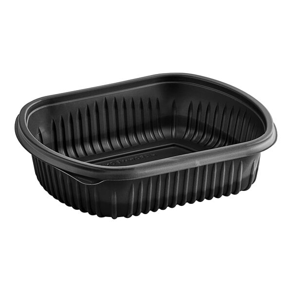 A Pactiv black plastic MealMaster container with a lid.