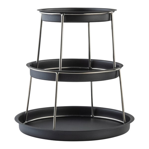 A Tablecraft 3-tier round black stainless steel display tower with metal legs.