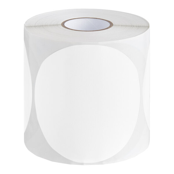 A roll of white paper with white circular labels.