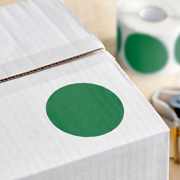 A white box with a roll of Lavex green inventory labels with a green circle on it.