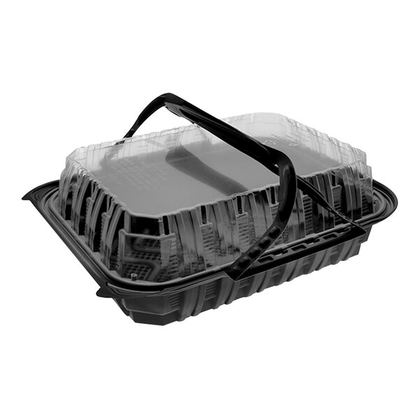 A black Pactiv MealMaster large plastic chicken barn with a handle.