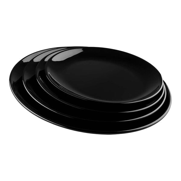 A stack of Tablecraft Sierra Collection black melamine platters.