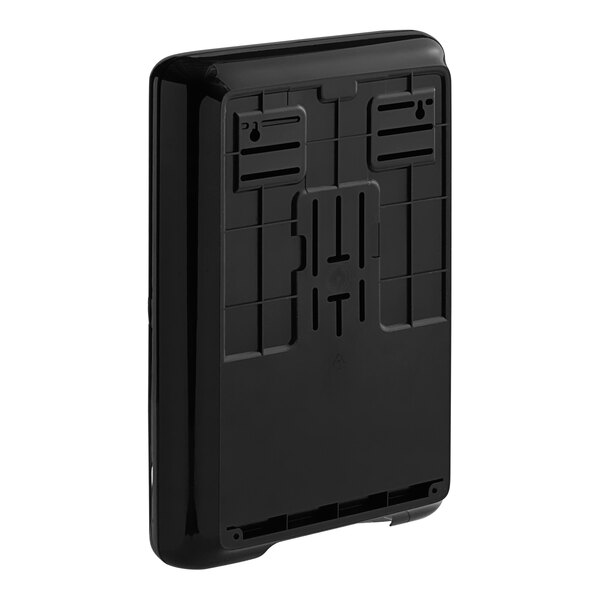 A black rectangular Tork wall-mount multifold hand towel dispenser.