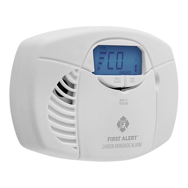A white electronic First Alert Carbon Monoxide Alarm with a digital display.