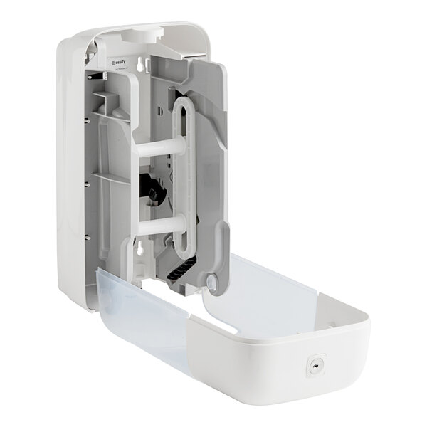 A white plastic Tork double roll toilet tissue dispenser with a plastic lid.