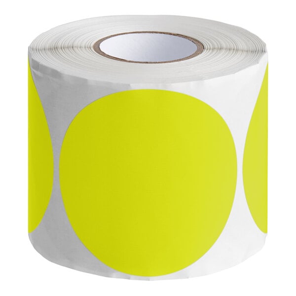 A roll of yellow and white round Lavex stickers.