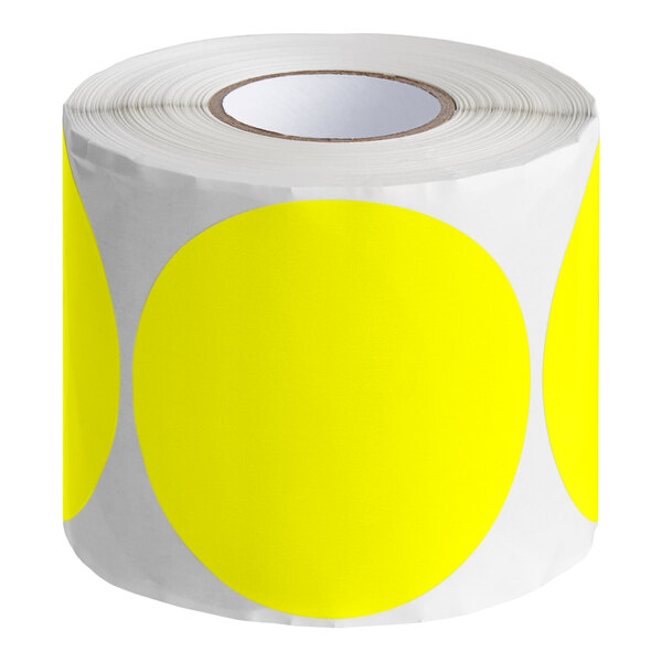 A roll of white stickers with bright yellow semi-gloss paper circles with Lavex branding on a roll.