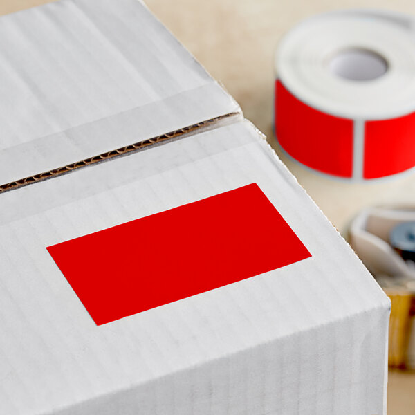 A white box with a red rectangular label on it.