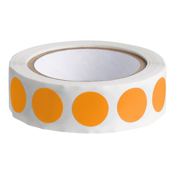 A roll of Lavex fluorescent orange paper inventory labels with orange circles.