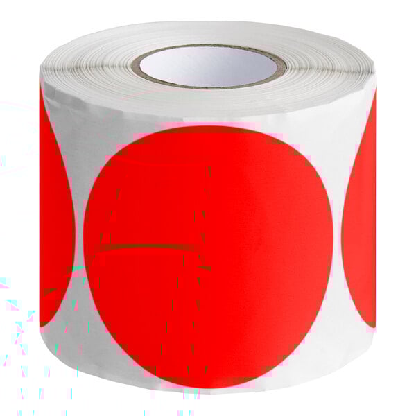 A roll of red semi-gloss paper Lavex inventory labels with white text.
