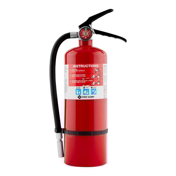 A red First Alert commercial fire extinguisher with a hose.