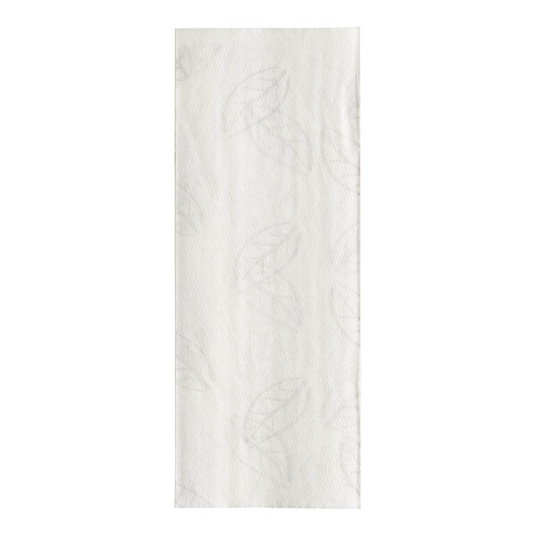 A white paper towel with a leaf design.