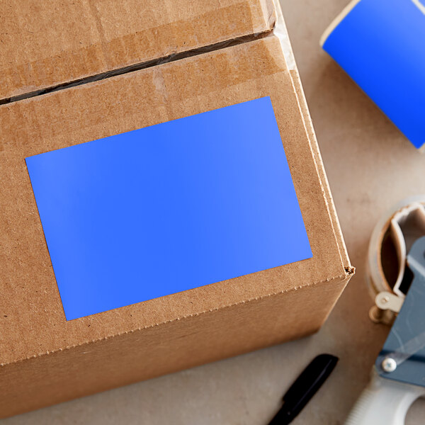 A cardboard box with a Lavex blue rectangular label on it.
