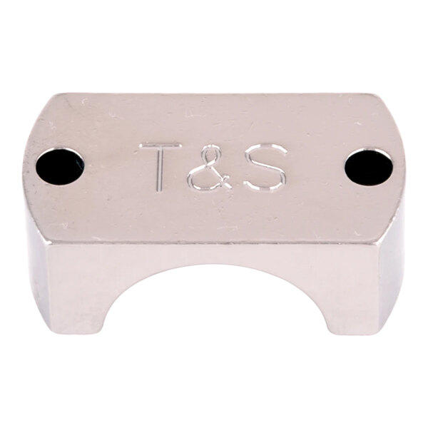 A small, rectangular, chrome-plated metal clamp with two holes and the letters 'T & S' engraved on the top surface.