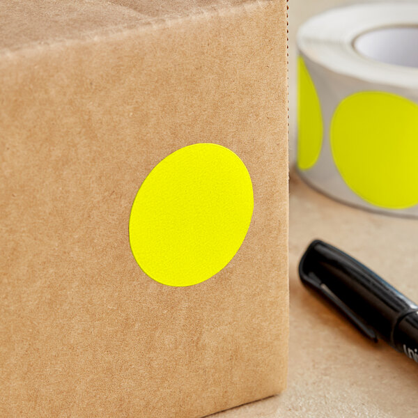 A brown box with a yellow round Lavex label on it.