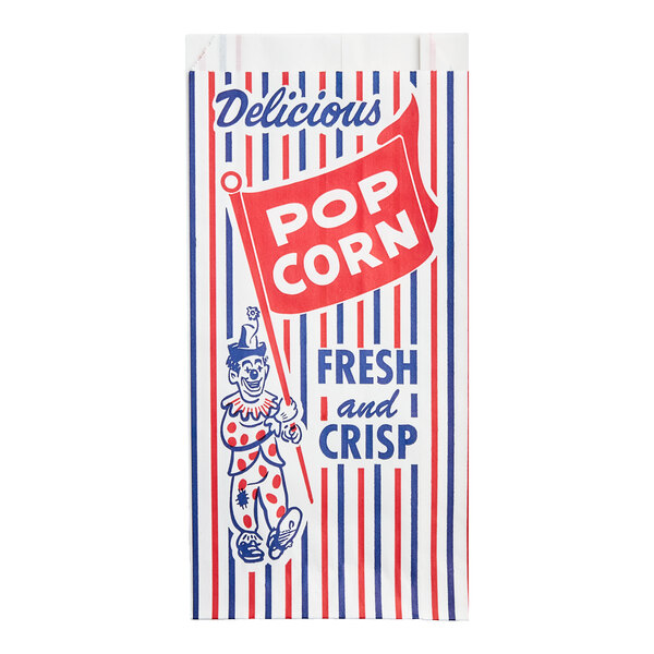 A red and white striped Bagcraft popcorn bag with a clown holding a flag and the word "Delicious" printed.