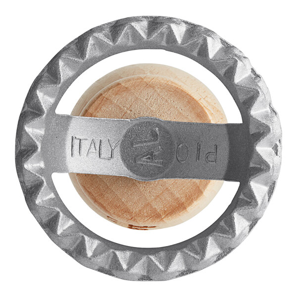 An Imperia Ravioli Cutter Stamp with a metal ring.