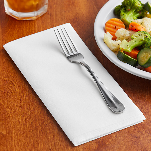 A fork on a plate of vegetables with a Morcon Valay white dinner napkin