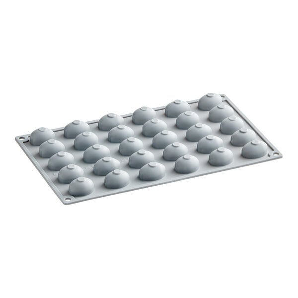 A close-up of a Pavoni Gourmand olive silicone baking mold with 30 compartments.