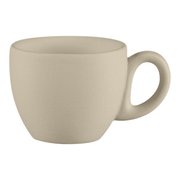 A gray porcelain espresso cup with a handle on a white surface.