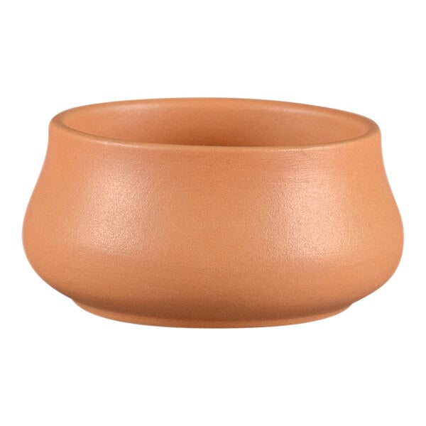 A close up of a RAK Porcelain Terra Cotta Thali bowl with a brown surface.