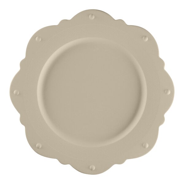 A gray porcelain plate with a scalloped edge.