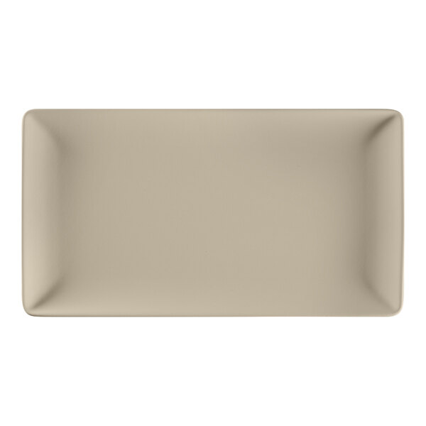 A rectangular white porcelain plate with black trim.
