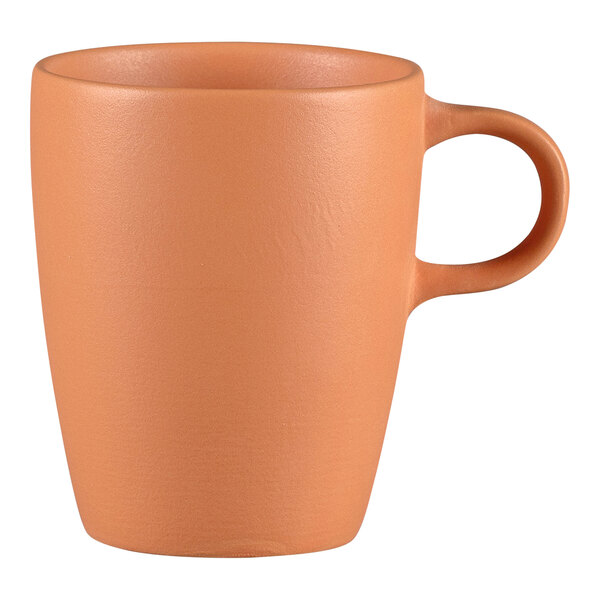 A RAK Porcelain Terra Cotta porcelain cup with a handle.