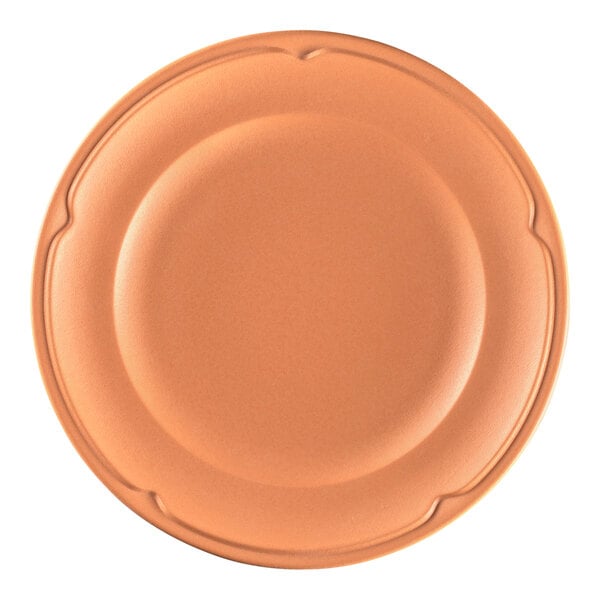 A close-up of a RAK Porcelain flat plate with a white background and brown rim.
