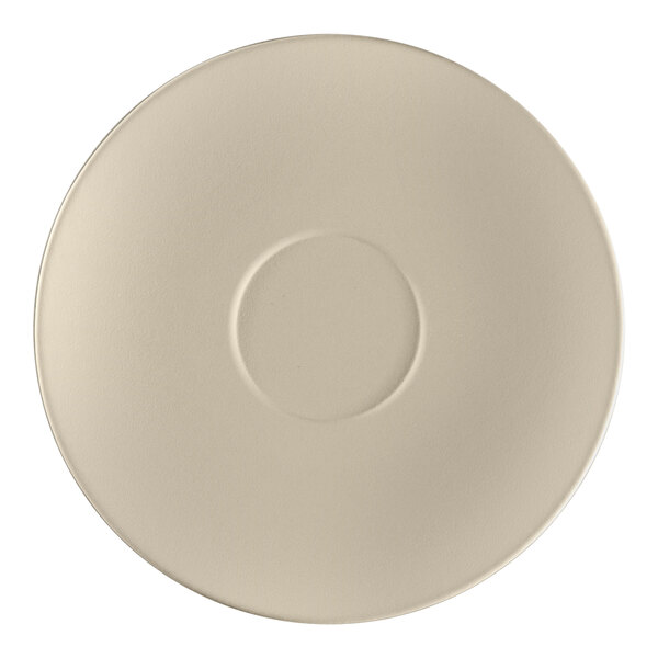 A gray porcelain saucer with a circular rim and a circle in the middle.