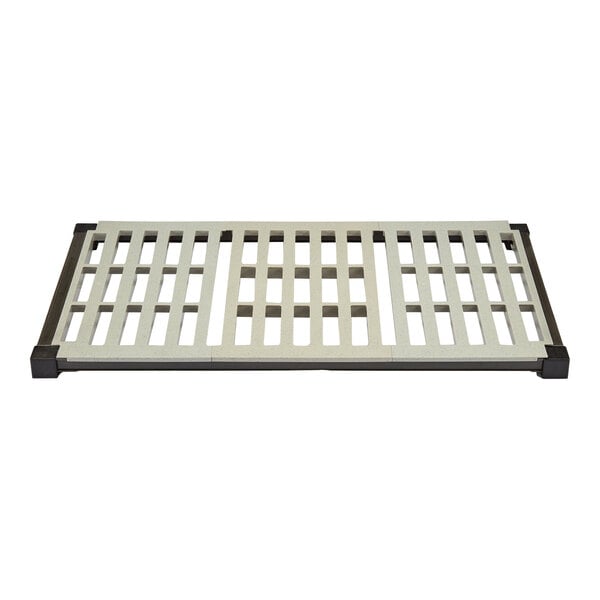 A white and black square Cambro vented shelf grate with holes.
