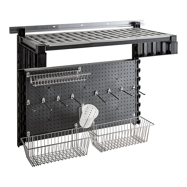 A black Camshelving® wall kit with hooks and baskets on a black peg board.